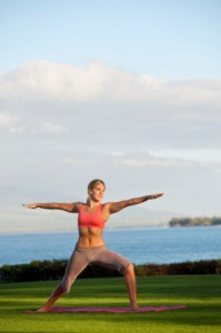 Yoga Teacher Demonstrating Warrior I Yoga Teacher Demonstrating Warrior I
